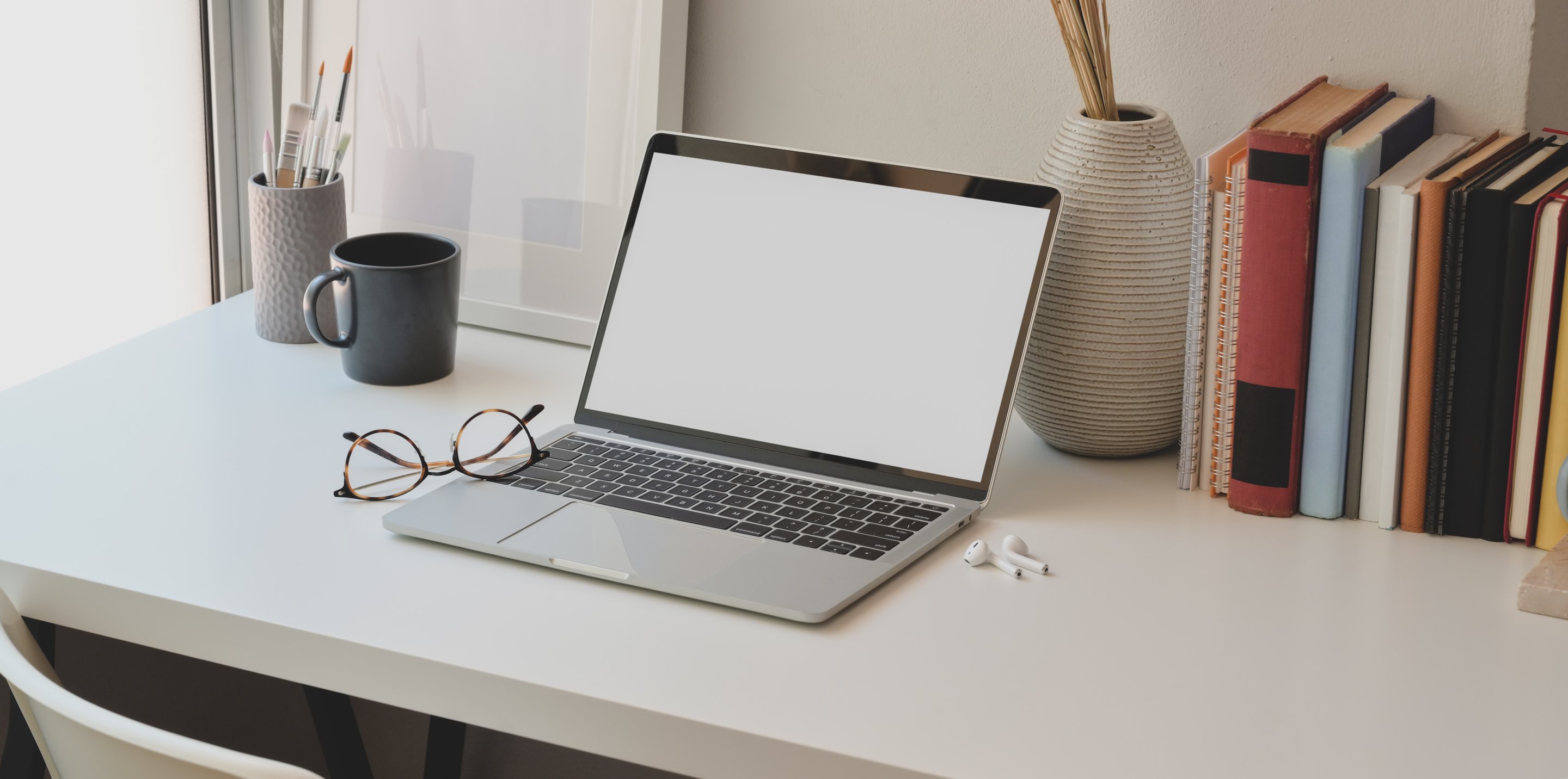 Photo Of Laptop Near Books